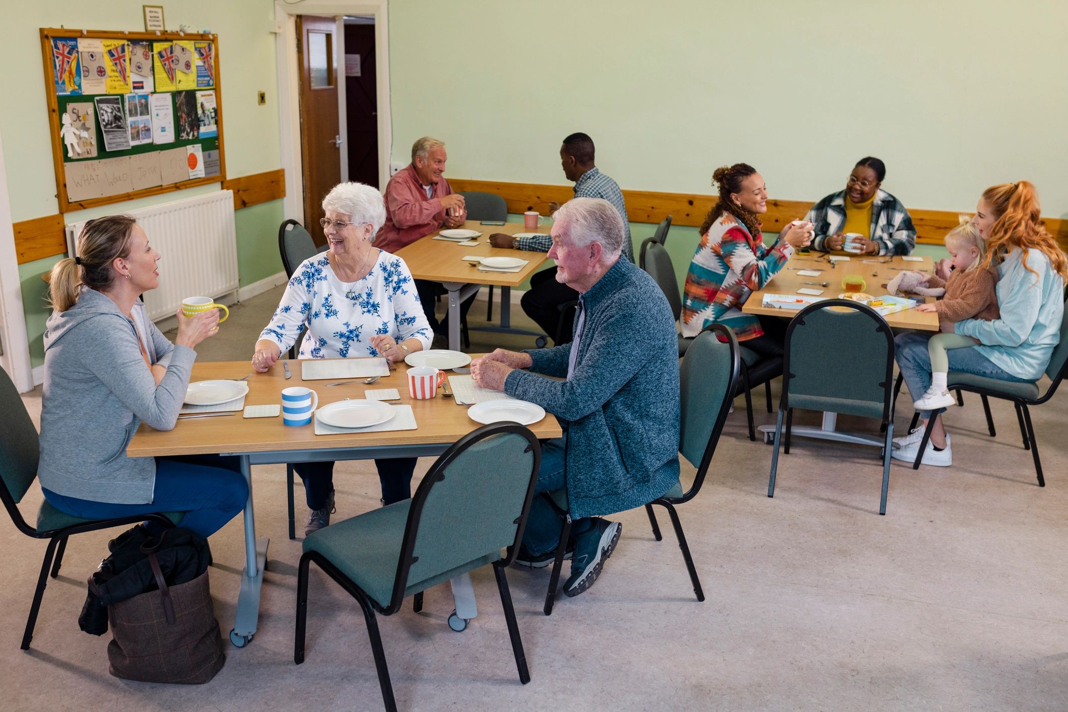 Community members gathered in a welcoming center